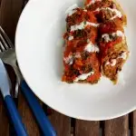 Mouthwatering, wholesome, flavorful and comforting fusion of Russian and American cuisine: Cabbage Rolls (Golubtsy) Stuffed with Chilli Con Carne. Great as a make-ahead seasonal meal!