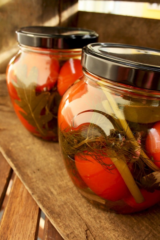 Russian Grandma's Pickled Tomatoes on the Wooden Table
