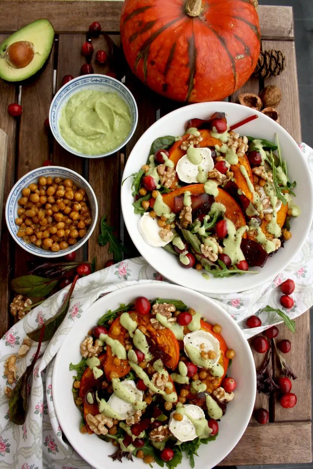 Colorful and healthy Warm Winter Salad with Pumpkin, Goat Cheese, Cranberries and Avocado Dressing. Comforting, delicious and easy holiday meal ready in 30 minutes!