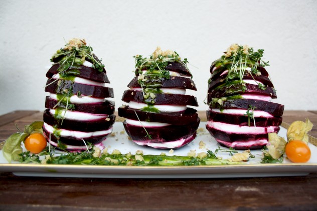 Beetroot Towers with Goat Cheese and Green Sauce Dressing: Impressive and fancy entrée ready in 10 minutes! Garnished with ground cherries, garden cress and walnuts.