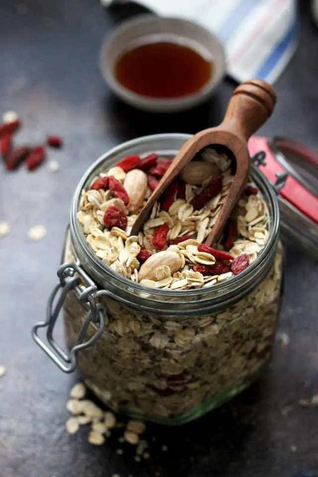 Muesli Recipe: A Healthy and Delicious Breakfast Idea - Muesli in a Jar with a Wooden Scoop