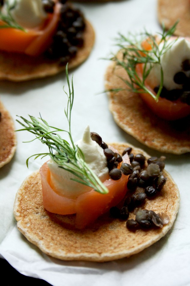 Healthy, gluten-free and delicious Russian style buckwheat pancakes made from only 5 ingredients in 20 minutes! Garnish them with smoked salmon, crème fraiche, beluga lentils and dill for a truly Russian flavor.