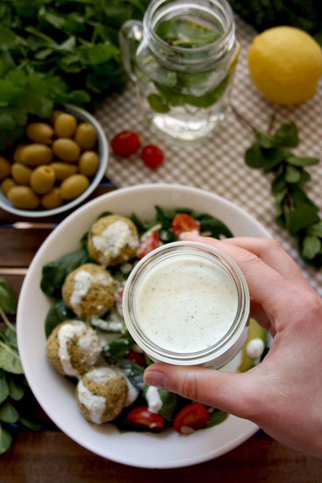 Crispy Baked Falafel with Hazelnuts and Creamy Lemon-Mint Sauce - Holding a Sauce for the Dish