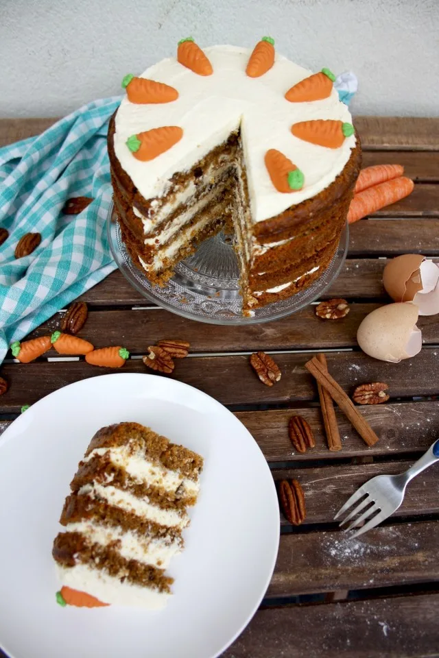 Super Moist Carrot Cake with Vanilla Cream Cheese Frosting - Serving on a White Plate