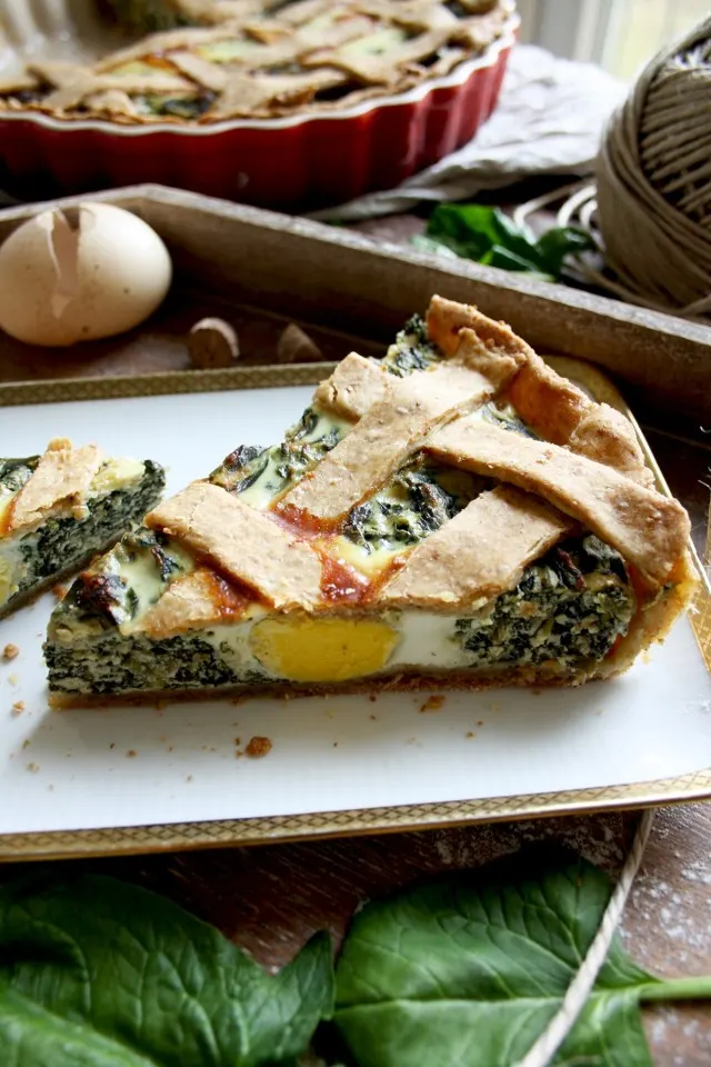The Best Rustic Ricotta Spinach Quiche Served in One Piece on a Light Tray