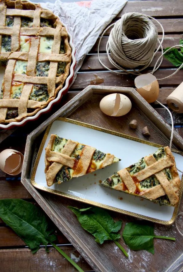 The Best Rustic Ricotta Spinach Quiche Beautiful Composotion of the Dish with Greens and Egg Shells