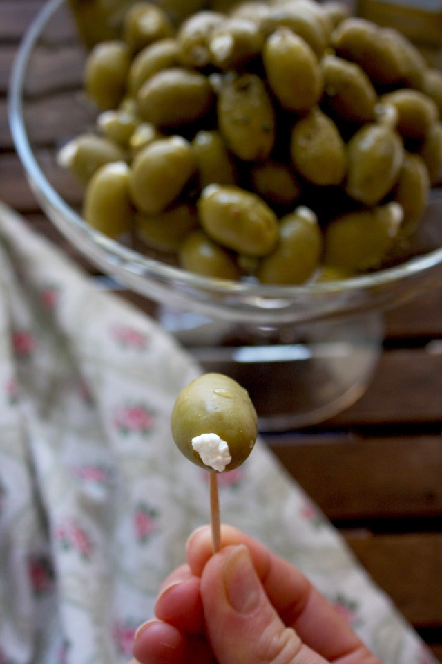 Cream Cheese Stuffed Olives - Holding an Olive in a Hand