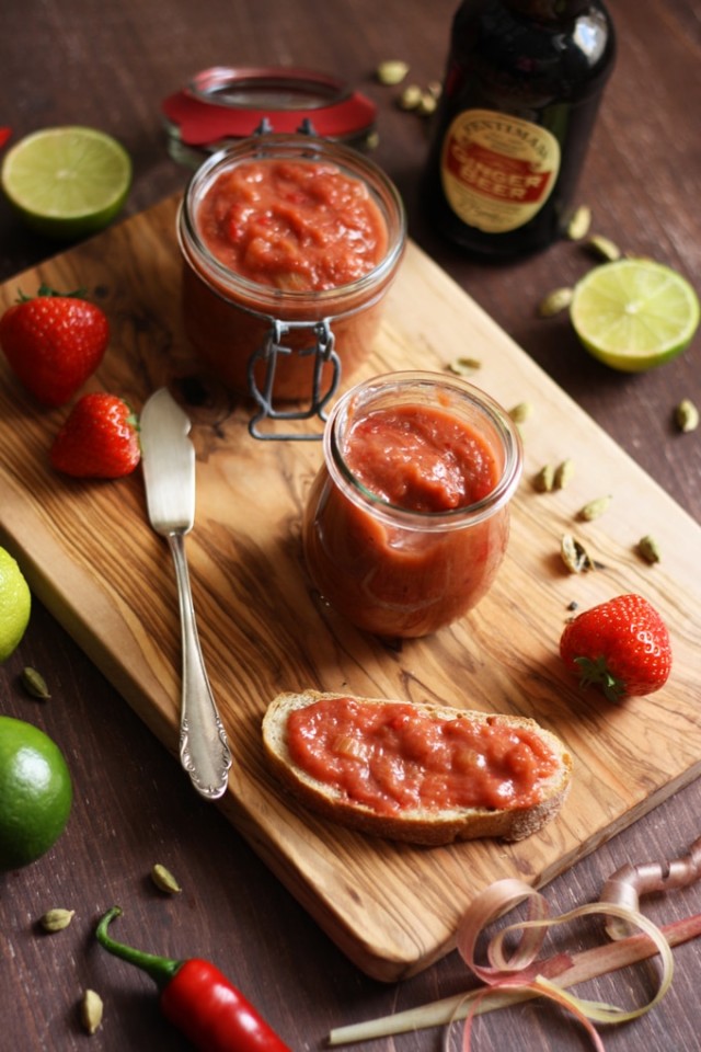Rhubarb Chutney with Strawberries and Ginger Composition on a Wooden Board on the Table