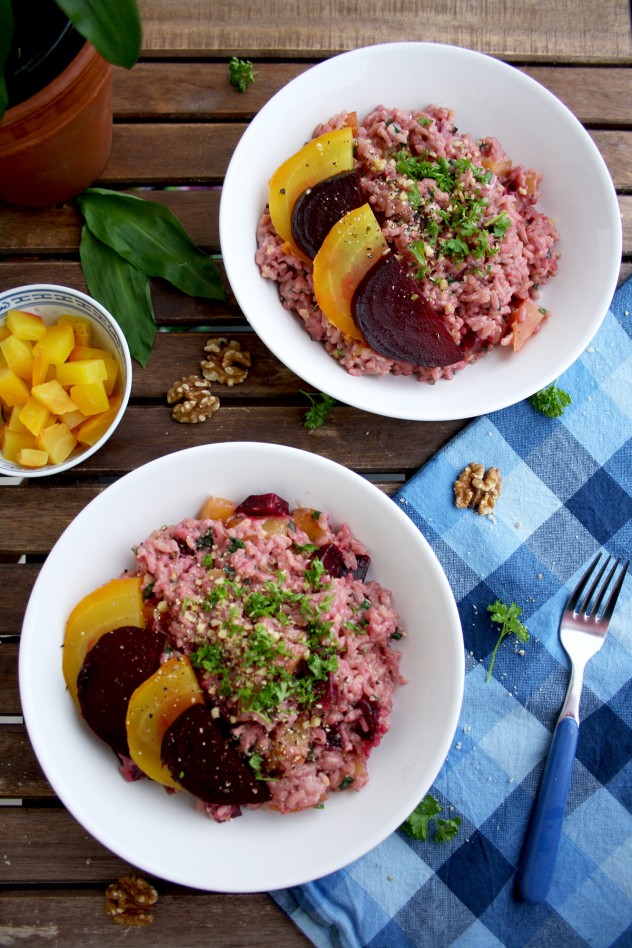 Creamy Beetroot Risotto with Goat Cheese, Wild Garlic and Walnuts is a delicious and colorful way to combine winter and spring flavors. Ready in 30 minutes! Gluten-free, vegetarian, healthy.
