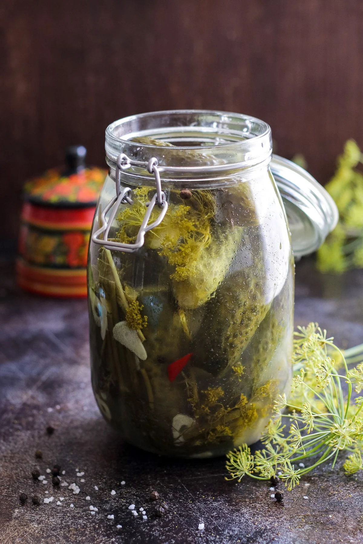 An opened jar with Russian pickles