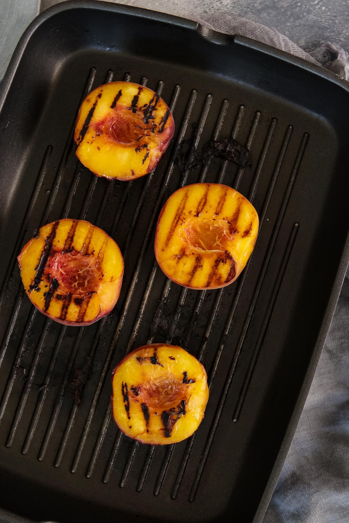 Grilled peaches on a griddle pan