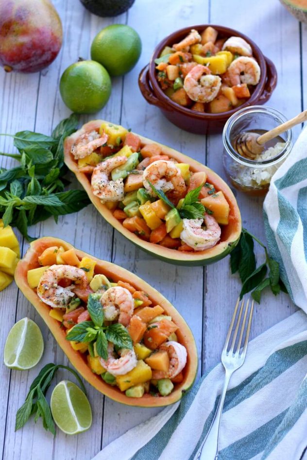 Refreshing and bright papaya salad with tropical fruits and prawns is a perfect summer dish. Easy, delicious and healthy recipe.