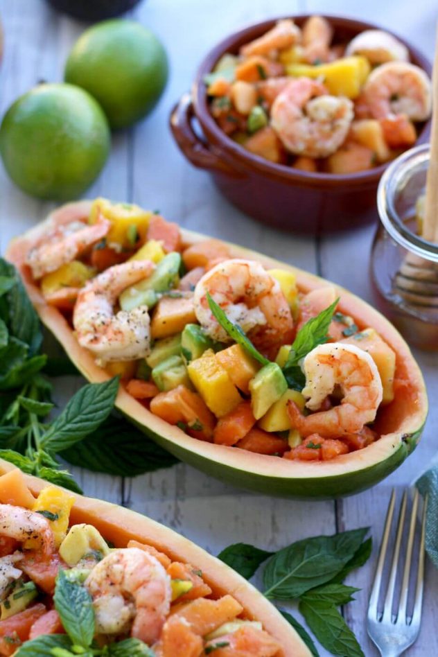 Refreshing and bright papaya salad with tropical fruits and prawns is a perfect summer dish. Easy, delicious and healthy recipe.