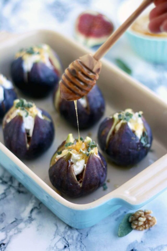 Easy 15-minute Baked Figs with Goat Cheese, walnuts, honey and sage recipe. These baked figs make for an elegant savory appetizer your guests will love!