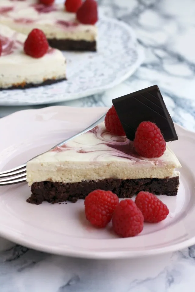 Healthy Brownie Cheesecake - Delicious Sweet and Textured Dessert Served in a Pink Plate with a Spoon