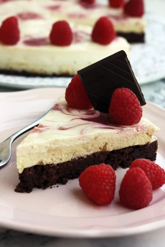 Healthy Brownie Cheesecake with Chocolate on Top and a Spoon in the Plate