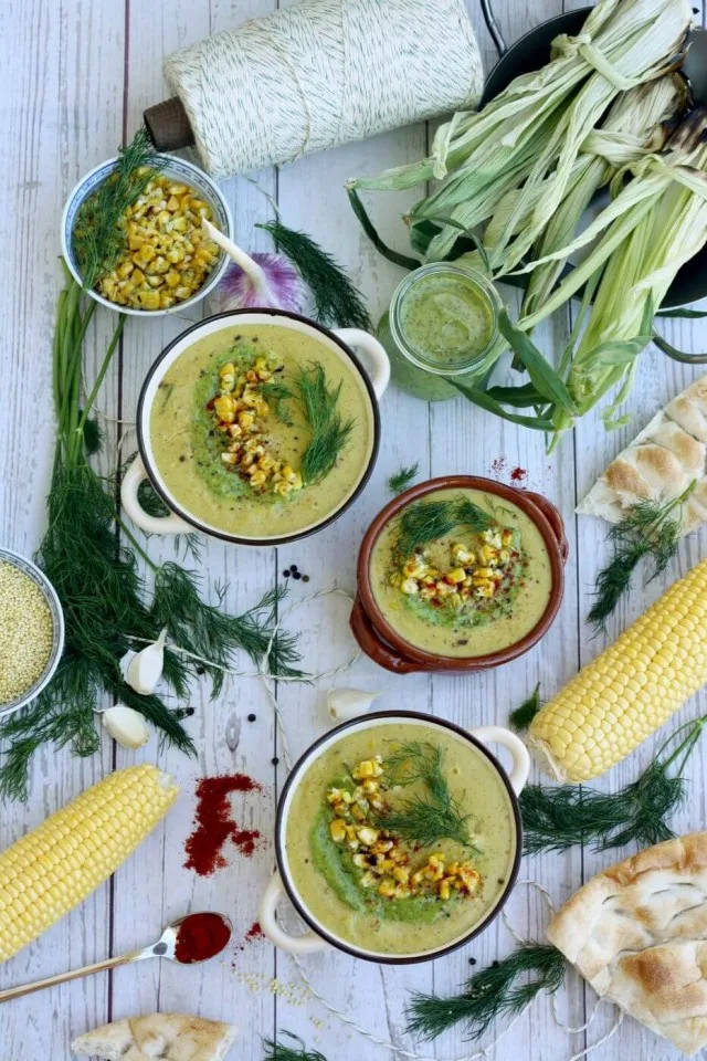 Incredibly creamy and easy vegan corn chowder soup recipe is ready in under 30 minutes. This smoky corn chowder is made of corn, zucchini, bell peppers, potatoes, coconut milk and millet. Perfect soup for early fall!