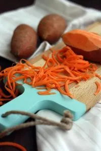 Healthy Sweet Potato Noodle Salad with Chickpeas and Rocket - Preparing Carrot Closeup