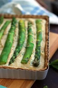 The Best Vegan Quiche Ever Closeup on Asparagus and the Corner fo the Tray