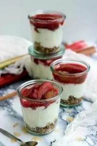 Light, fluffy and delicious Cheesecake in a Jar recipe made with skillet granola, cottage cheese Greek yogurt filling and roasted vanilla rhubarb topping is healthy, easy and takes 30 minutes to make from start to finish! It makes for a great dessert, takeout snack, breakfast or brunch meal. Perfect for Easter!