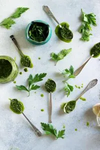 Easy 5-minute Vegan Chimichurri Sauce recipe made with parsley, garlic, lemon, vinegar and olive oil balances the flavors of any savory dish, not only steak! Perfect condiment for the summer grilling season!