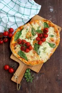 Foolproof Step-by-Step Homemade Pizza Crust Recipe: The only pizza crust recipe you'll ever need. Quick, easy, delicious and so much healthier than store-bough