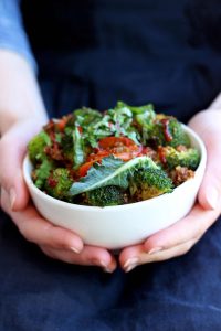 Simple Vegan Quinoa Fried Rice - Holding in Hands in a White Bowl