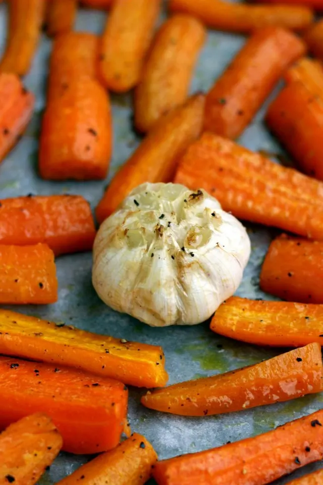 Vegan Roasted Carrot Soup with Lentils - Roasting Carrots and Garlic Closeup