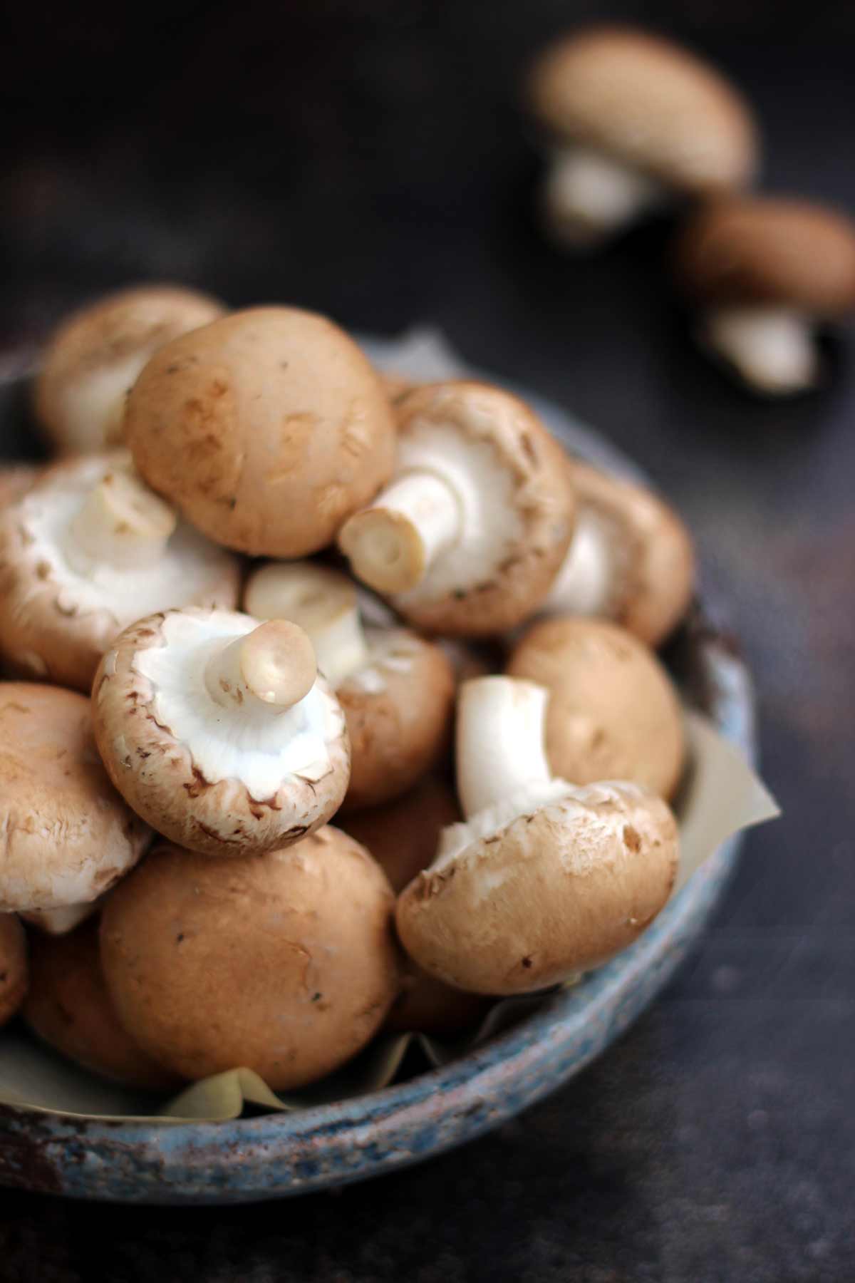 Crimini Mushrooms in a Grey Bowl
