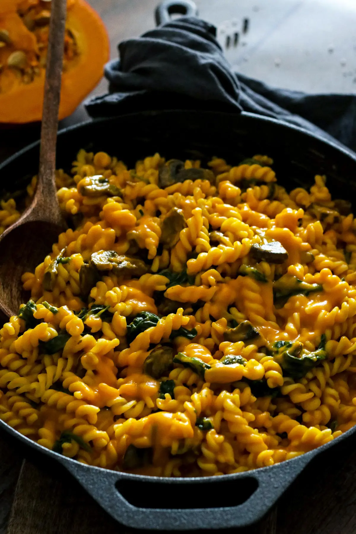 Pumpkin Pasta with Mushrooms and Spinach in a Skillet.