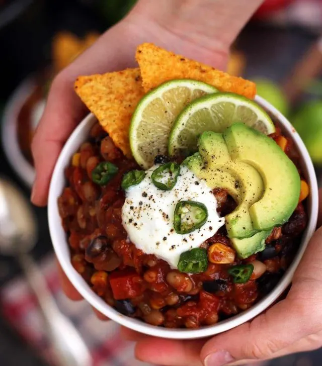 cropped-The-Best-Slow-Cooker-Vegan-Chili-Hands-Holding-a-Bowl-of-Chili.jpg