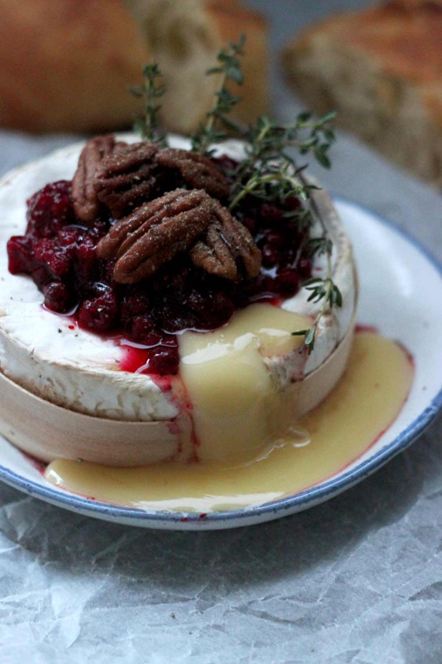 Easy Cranberry Baked Brie with Thyme Closeup with Brie Running