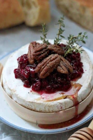 Easy Cranberry Baked Brie with Thyme Closeup Served