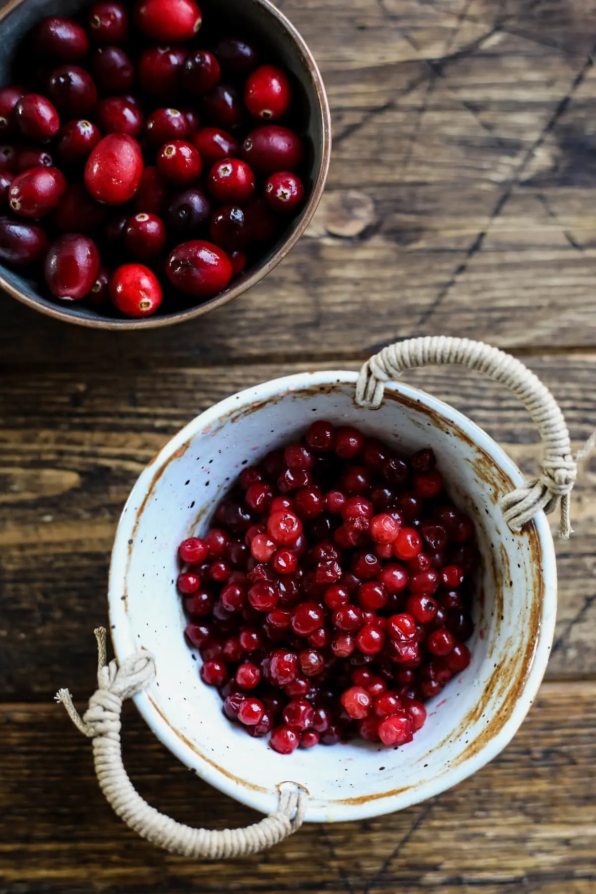 Cranberries and Lingonberries in Bowls.