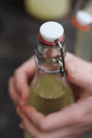 Opening a Flip Top Bottle Gif