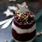 15-Minute Pomegranate Parfaits with Pistachios - Stars in the Background with Spoons Ready for the First Try
