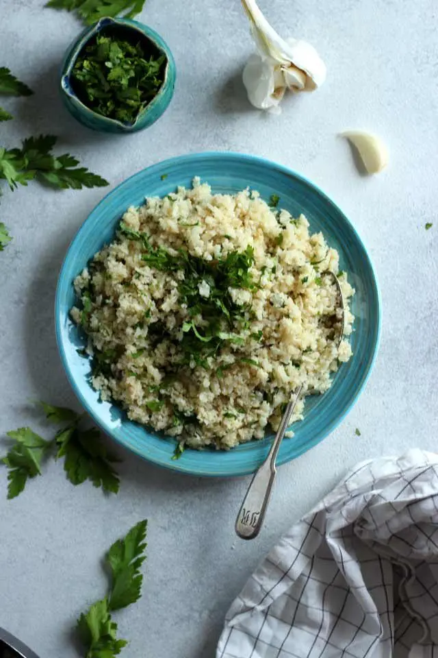 Rice on a Blue Plate with Parsley and Garlic
