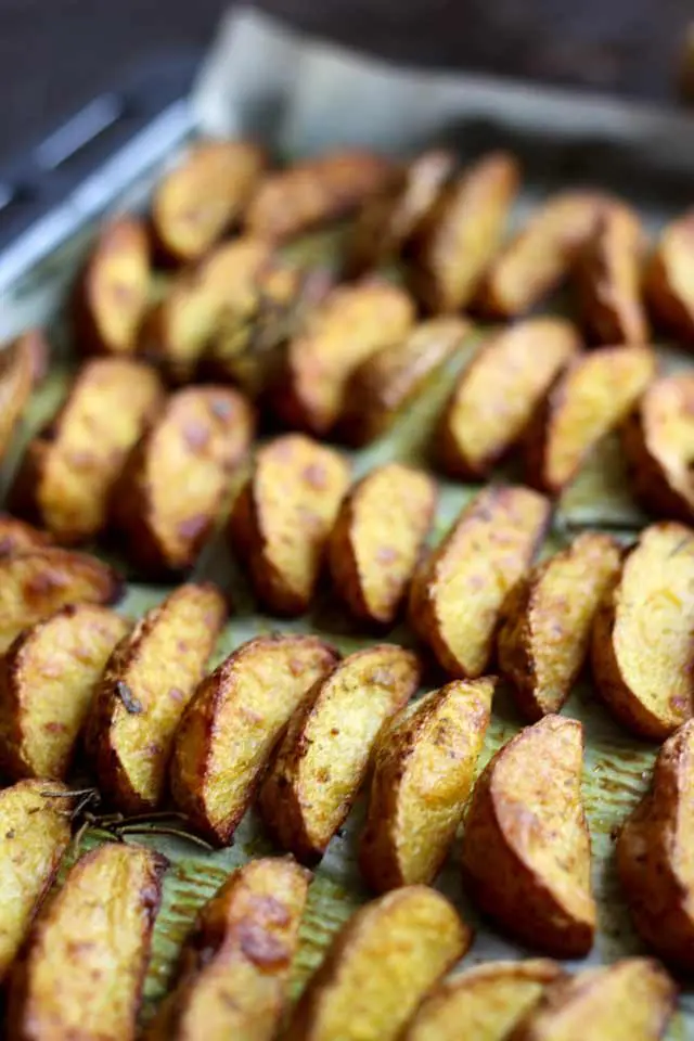Easy Baked Potato Wedges Assembled in Lines and Looking Delicious