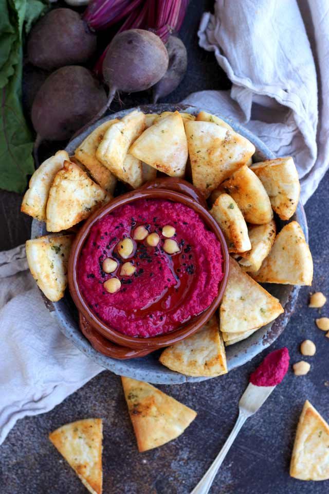 Roasted Beet Hummus in a Bowl with Pita Chips