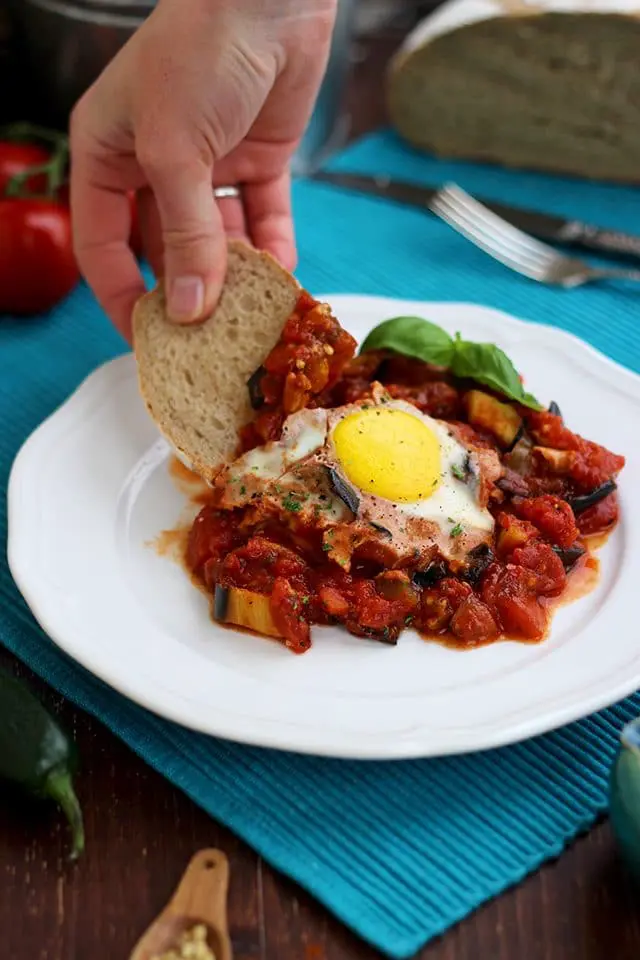 The Best Shakshuka Recipe - Dipping Bread in the Dish