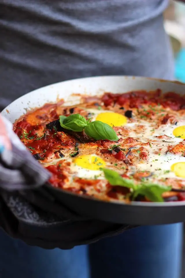 The Best Shakshuka Recipe - Side View of the Dish Being Served to the Table