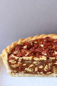 A Cut of Vegan Pecan Pie with Lots of Pecans in the Filling.