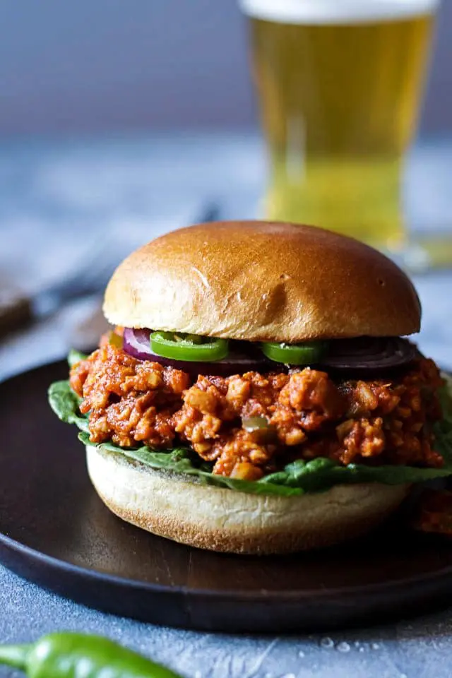 Vegan Sloppy Joes with a Glass of Beer in the Background