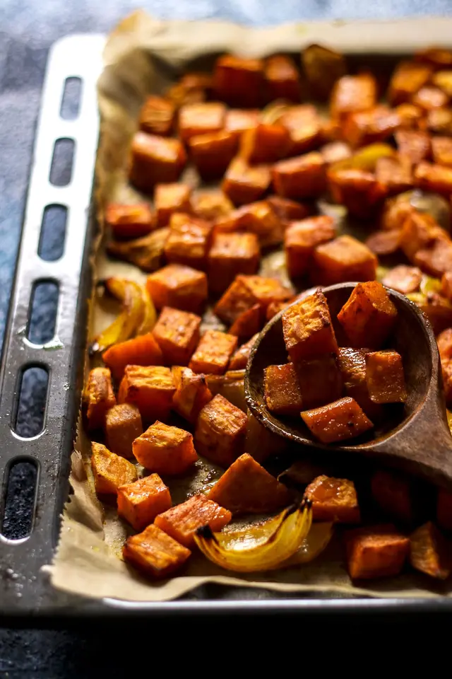 Roasted Sweet Potatoes and Onions in a Baking Dish