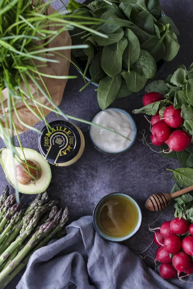 Ingredients for Asparagus Radish Salad on a Grey Board