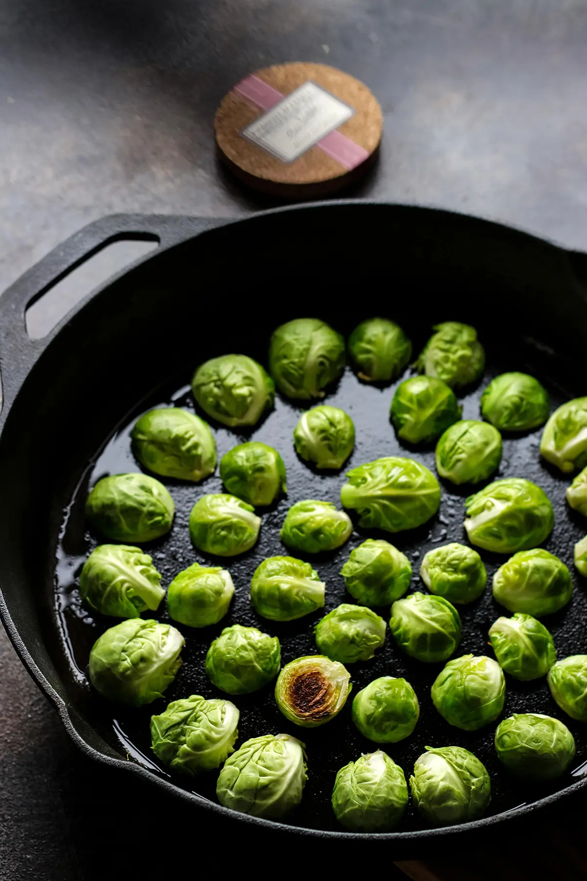 Brussels Sprouts in a Cast Iron Skillet Cut Side Down