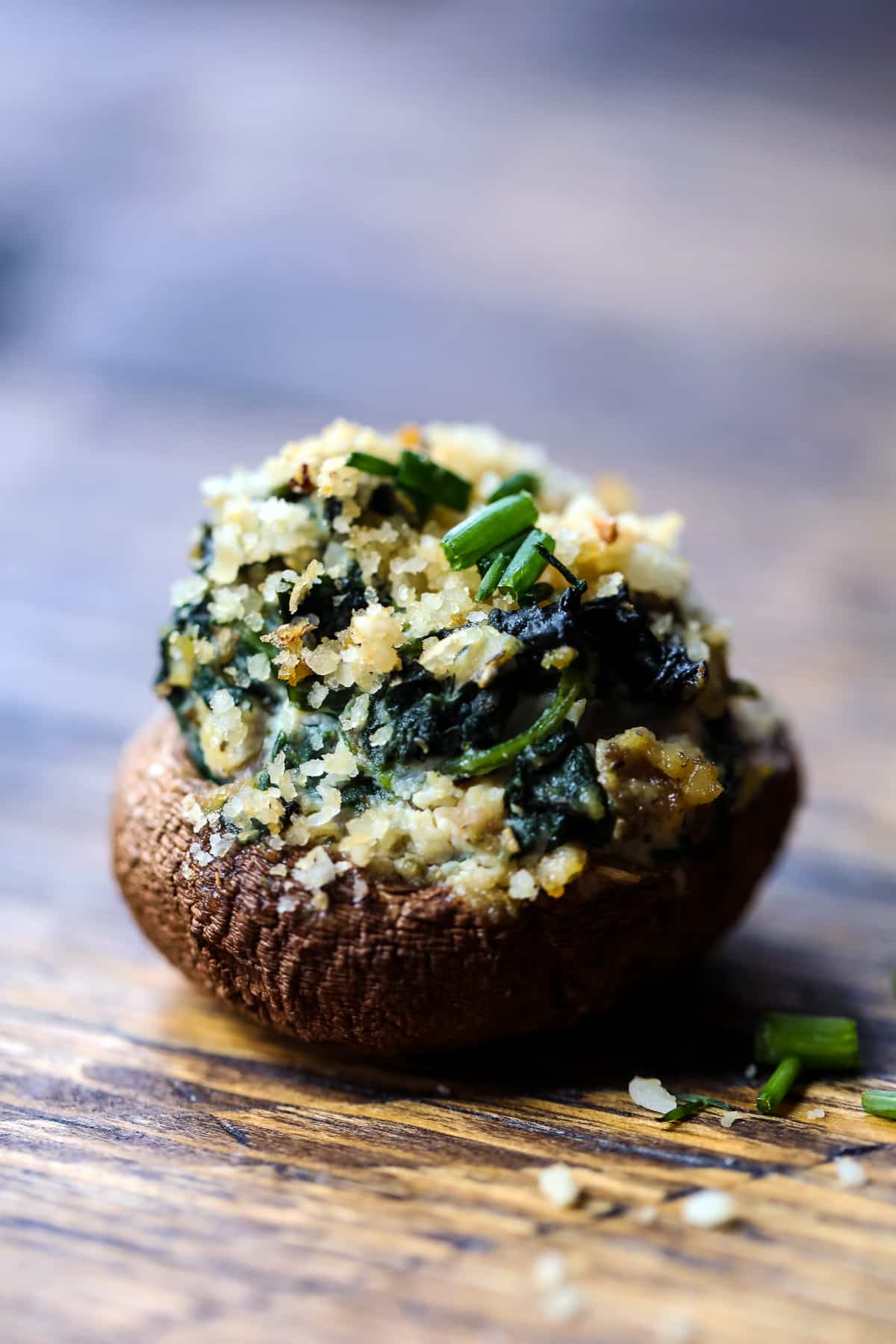 A Closeup of a Vegan Stuffed Mushroom with Spinach and Ricotta.