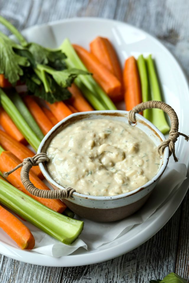 Vegan Blue Cheese Dip in a Bowl with Carrot and Celery Sticks.