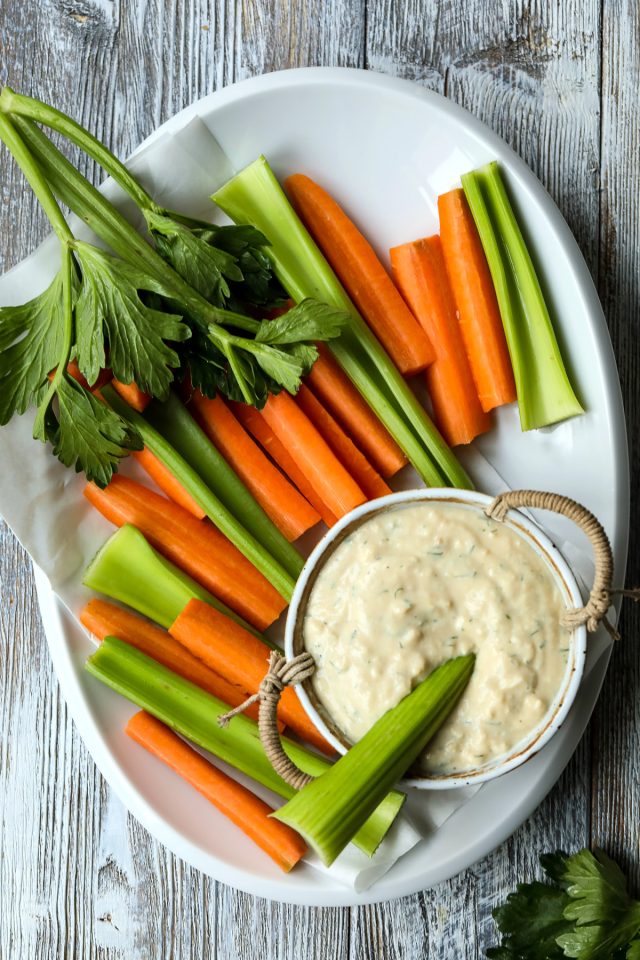 Vegan Blue Cheese Dressing  with Carrot and Celery Sticks.